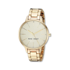 Reloj de pulsera con detalles de cristal para dama marca Nine West. Brazalete metálico color dorado.