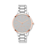 Reloj de pulsera con detalles de cristal para mujer marca Nine West. Brazalete de eslabones metálicos, ajustable, en color plata.