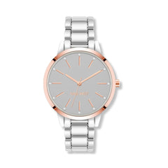 Reloj de pulsera con detalles de cristal para mujer marca Nine West. Brazalete de eslabones metálicos, ajustable, en color plata.