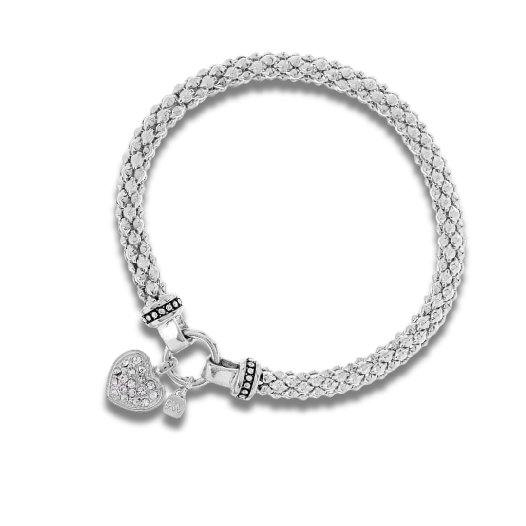 Pulsera elástica con dije de corazón y cristales plateados para mujer, marca NINE WEST. Brazalete para mujer de NINE WEST.