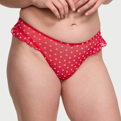High-leg Thong Panty VS. Panti Victoria Secret para mujer. Color rojo. Tanga pierna alta. Coleccion Tease, con vuelos.